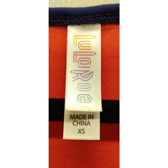 Lularoe NWT Size XS Classic Tee Coral Short Sleeves Navy Blue Trim High Low Top - Picture 3 of 6